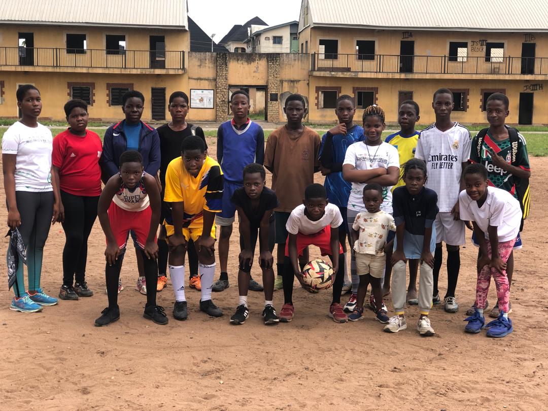 Young athletes of Emmanuel Ekeji Sports Academy together on the training ground