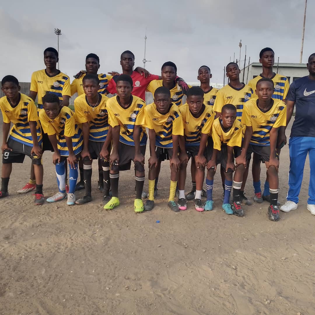 EESA football squad lined up before a match